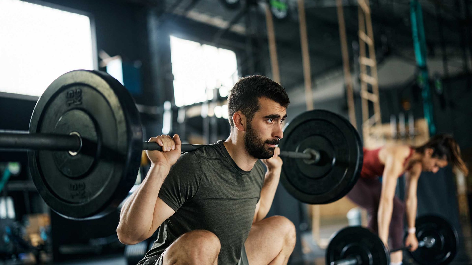 male-athlete-doing-barbel-back-squat-exercise-whil-2023-11-27-05-06-45-utc male-athlete-doing-barbel-back-squat-exercise-whil-2023-11-27-05-06-45-utc